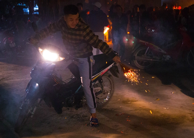 Some people who live far away from the temple have to make the run on motorbikes.