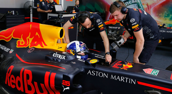 Coulthard, runner-up in the 2001 Formula One World Drivers Championship, is prepared before he drives the car out of a garage for the very first performance of the F1 auto racing in Vietnam on Friday afternoon.