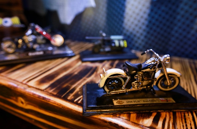 To share his passion for vehicles, Nhut decorates his shop on 17A Street with these motorcycle figures.