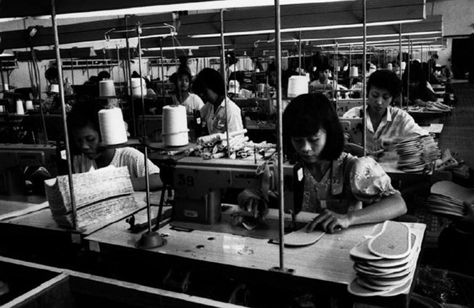 Making shoe soles in a factory.