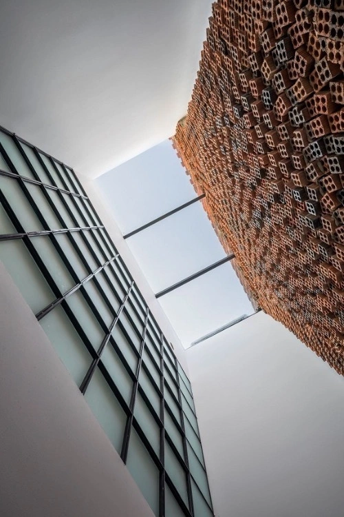 Natural light penetrates via the sky light.