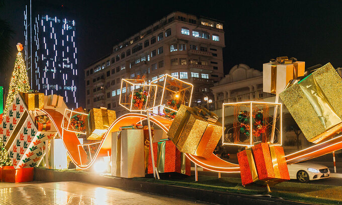 A corner of Lang Ha Street is lightened up by lights and Christmas decorations.