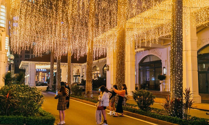 A hotel on Kim Ma Street is brightened up by thousands of lights.