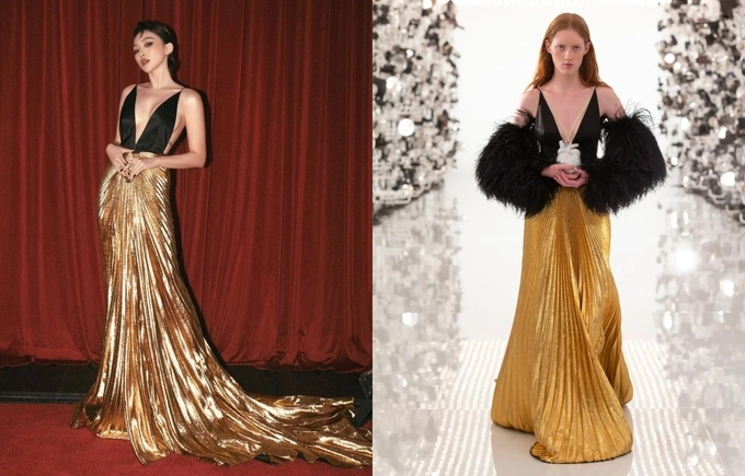 Singer Toc Tien removes the feather sleeves when wearing her deep V-cut dress.