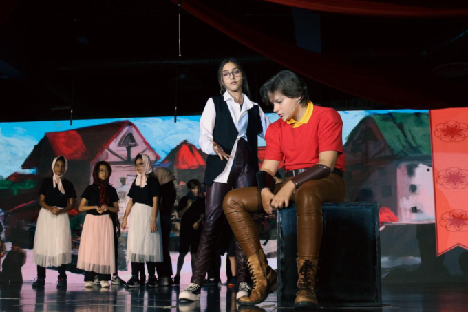 EIS students’ artistic individuality flourishing in a play. Photo by EIS