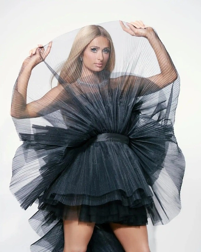Paris Hilton wears a dress designed by Le Thanh Hoa for Saturday magazine. Photo by The Guardian