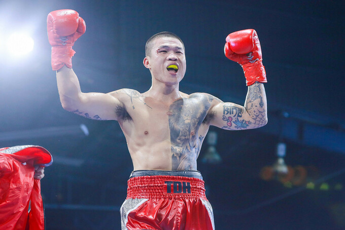 Truong Dinh Hoang celebrates his victory against South Koreas Dae Hyun-baek in HCMC, March 25, 2023. Photo by VnExpress/Quang Liem