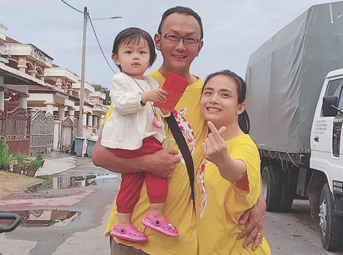 Tien, Lim and their daughter in January 2023. Photo courtesy of the couple
