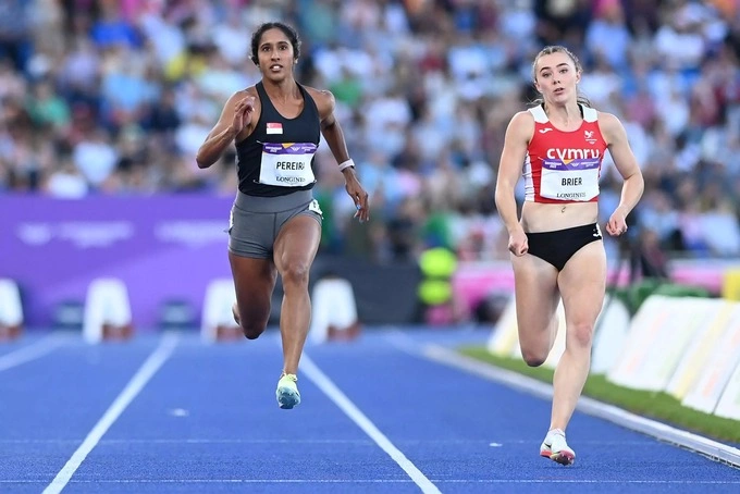Shanti Pereira (L) hopes for two golds in Phnom Penh. Photo by AFP/Glyn KIRK