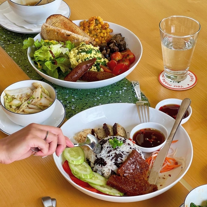 Veganizta offers a brunch menu with vegan versions of classic dishes such as com tam and scrambled eggs with toast. Photo courtesy of Veganitza