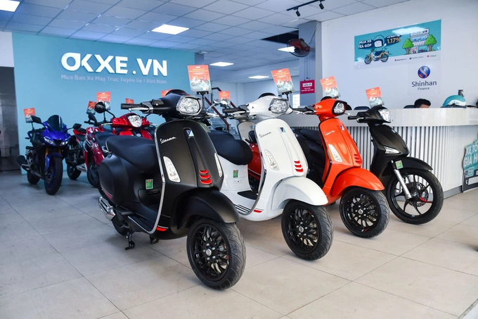 OKXE sells new motorbikes with Piaggio and Vespa scooter models. Photo by OKXE