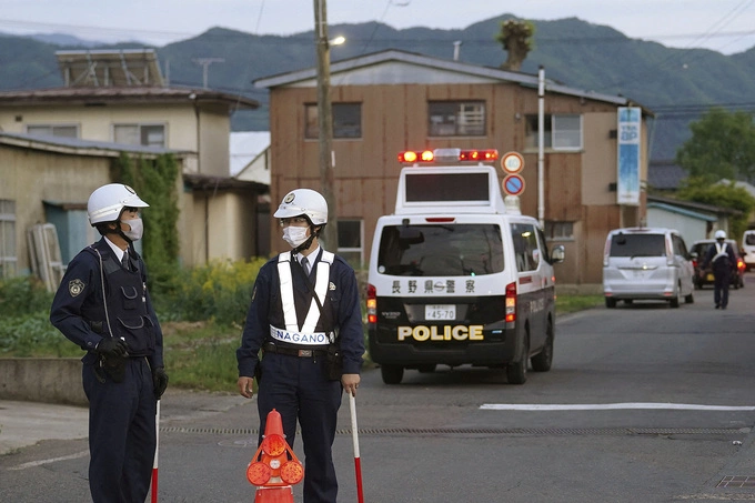 Police officers stand near the shooting and stabbing incident scene in Nakano, Japan on May 25, 2023. Photo by Reuters