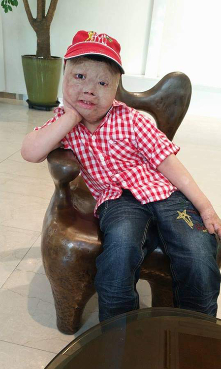 Linh during a trip with his mother before enrolling in primary school. Photo courtesy of Linhs family