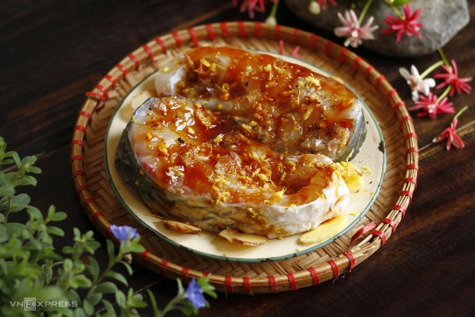The marinated fish displays a vivid red hue. Photo by VnExpress/Bui Thuy