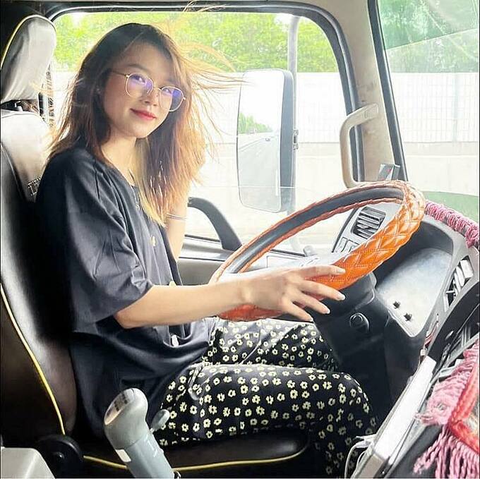 Ngo Thi My Hanh, 24, inside her truck. Photo courtesy of Hanh