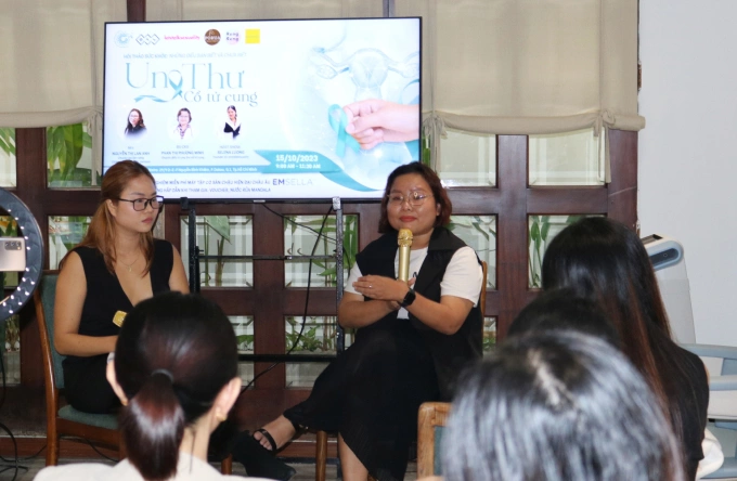 Chau (L) during a talk in Ho Chi Minh City on July 15, 2023, which she co-hosts with health expert Phan Thi Phuong Minh, where she shares with attendees knowledge about cervical cancer. Photo courtesy of Chau
