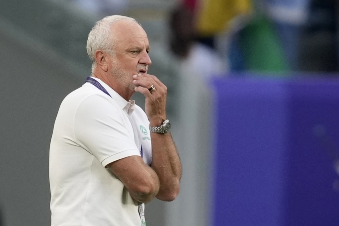 Australias coach Graham Arnold reacts during the Asian Cup Group B soccer match between Australia and Uzbekistan at Al Janoub Stadium in Doha, Qatar, Jan. 23, 2024. Photo by AP/Thanassis Stavrakis
