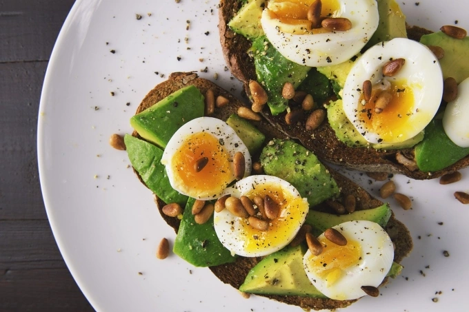 Toasts with avocados and eggs. Illustration photo by Pixabay
