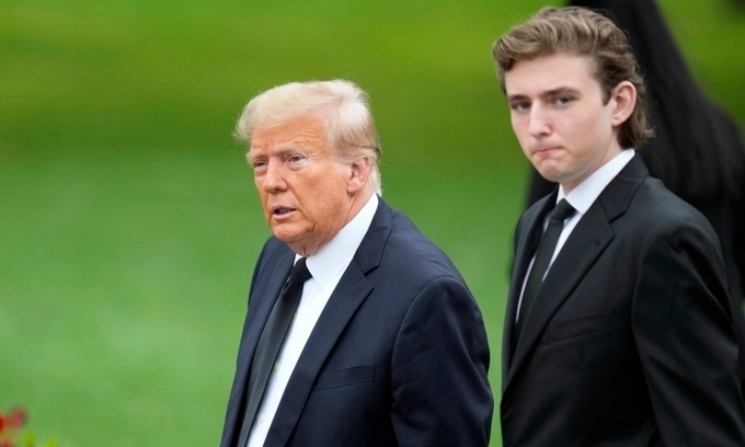 Former U.S. President Donald Trump (L) arrives with his son Barron for the funeral of the former first ladys mother at the Church of Bethesda-by-the-Sea in Palm Beach, Fla., Thursday, Jan. 18, 2024. Photo by AP