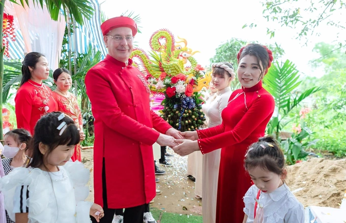 Bertrand and Xuan at their wedding in 2023, two years after registering their marriage. Photo courtesy of Xuan