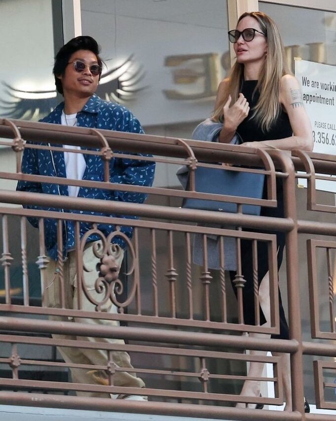 American actress Angelina Jolie (R) and her adopted Vietnamese-born son Pax Thien Jolie-Pitt at Sushi Park restaurant on July 12, 2024. Photo from Pax Thiens fanpages Instagram
