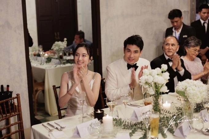 Model Nong Poy (far L) and her husband (second from L), businessman Oak Phakwa Hongyok, at another event. Photo from Nong Poy’s Instagram