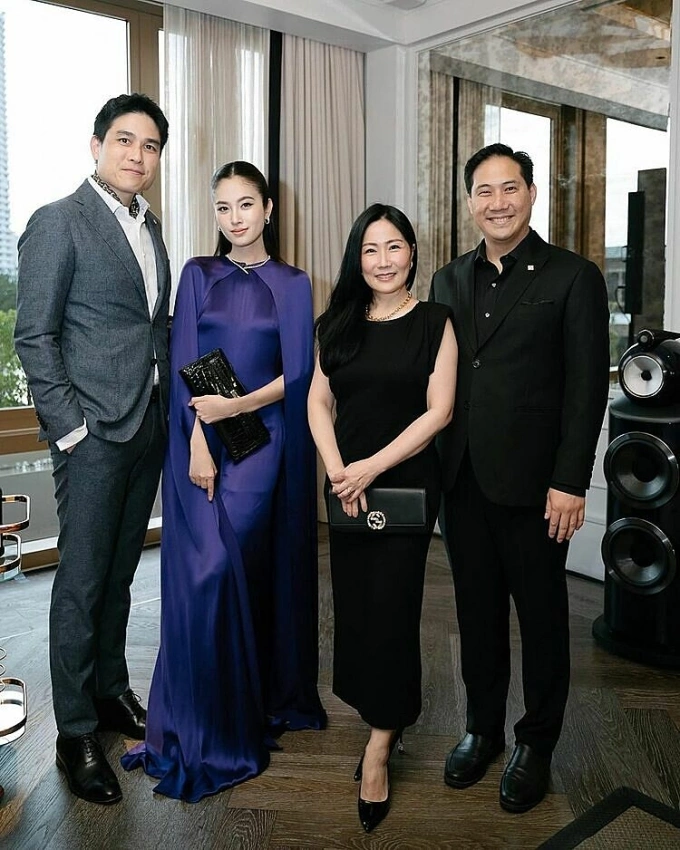 Model Nong Poy (second from L) and her husband (far L), businessman Oak Phakwa Hongyok, at a BMW event on July 14, 2024. Photo from Nong Poy’s Instagram