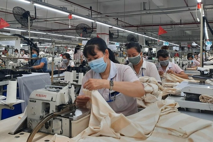 Nobland Vietnam’s workers during production hours. Photo by VnExpress/Le Tuyet