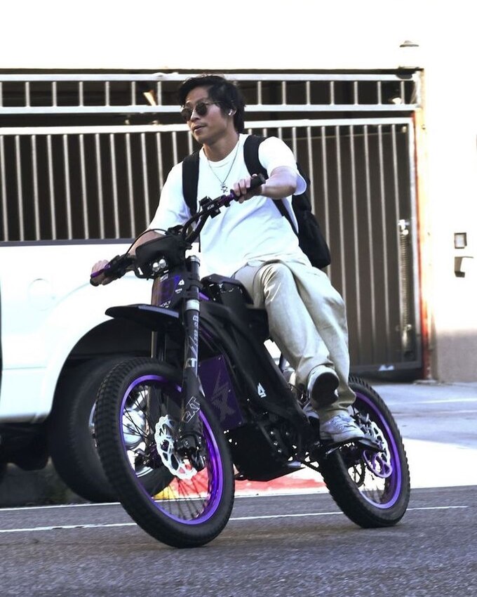 Pax Thien driving his electrical bike on the street of Los Angeles July 11. Photo from Instagram/paxalbum
