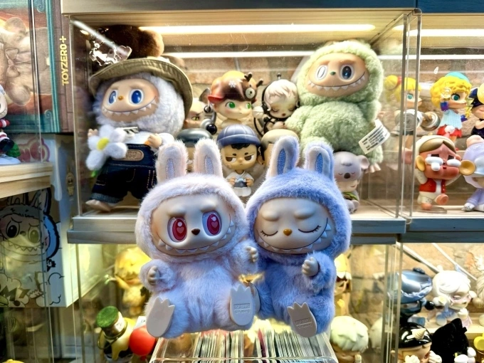 Four Labubu toys among other toy collections owned by Minh Tan. Photo courtesy of Minh Tan