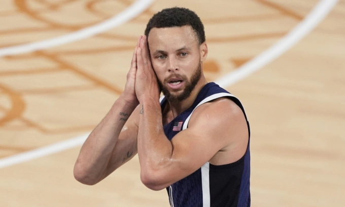 United States Stephen Curry (4) reacts after a three-point basket against France in the mens gold medal basketball game at the 2024 Summer Olympics, Saturday, Aug. 10, 2024 in Paris, France. Photo by AP