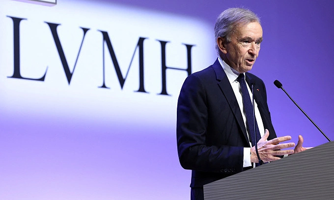 LVMH chairman and CEO Bernard Arnault speaks at a press conference on Jan. 25, 2024. Photo by Reuters