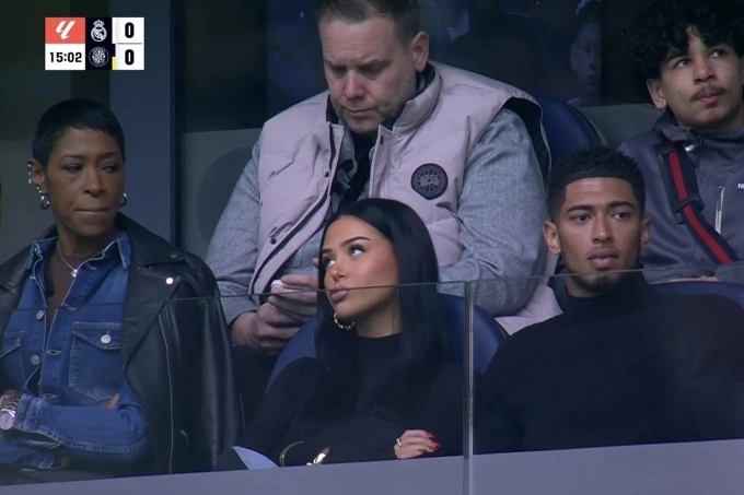 A viral screenshot of Ashlyn Castro (C) with Jude Bellingham and his mother during the La Liga match between Real Madrid and Girona on Feb. 23, 2025