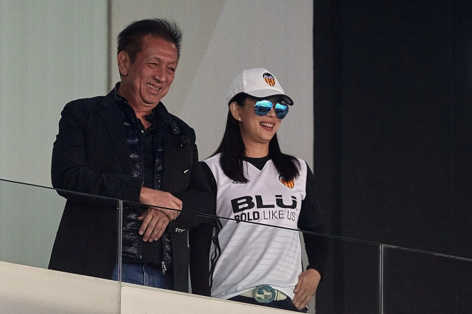 Peter Lim and his wife Cherry Lim at a game of Valencia CF. Photo by AFP