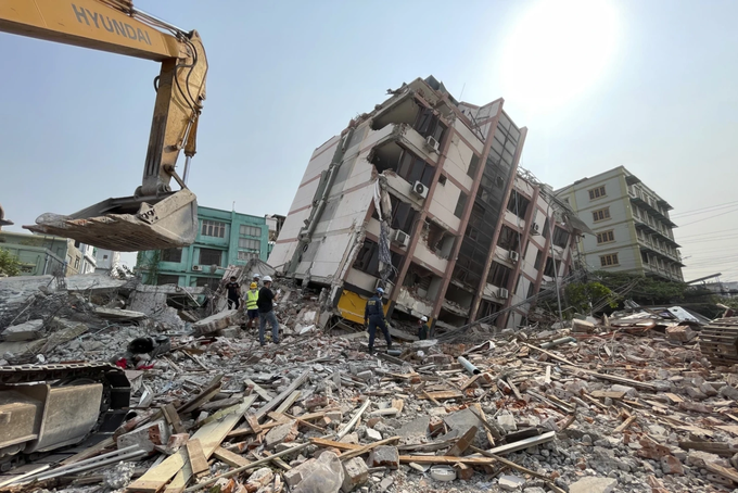 In this photo release by Xinhua News Agency, rescuers carry out search and rescue on the damaged buildings in the aftermath of an earthquake in Mandalay, Myanmar, Monday, March 31, 2025. Photo by AP