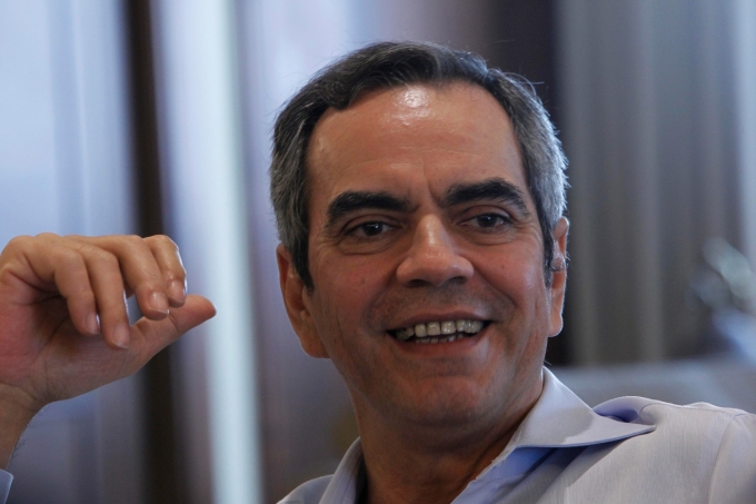 5 richest Filipino billionaires’ combined wealth rise by $7.6B 3 Enrique Razon Jr, chairman of Bloomberry Resorts Corporation, smiles during a Reuters interview inside his office in Port Area, Metro Manila December 17, 2012. Photo by Reuters