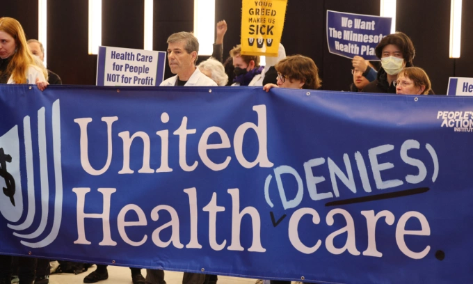 Protesters with Peoples Action target health insurance giant UnitedHealth Group due to exorbitant health insurance costs and insurance claims denials on April 16, 2024 in Eden Prairie, Minnesota. Photo by AFP