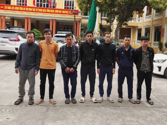 Seven individuals among 14 investigated for operating an illegal gambling and money laundering ring in Vietnam. Photo courtesy of Ninh Binh Police
