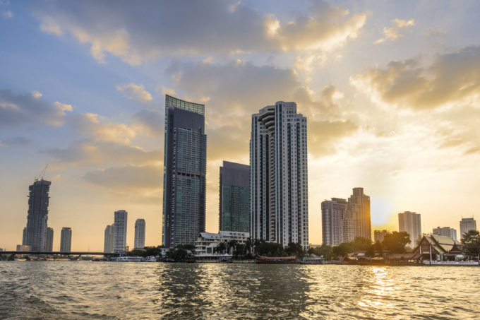 Thailand, Bangkok, Khlong San district, skyscrapers along the Chao Phraya river. Photo by Hemis via AFP
