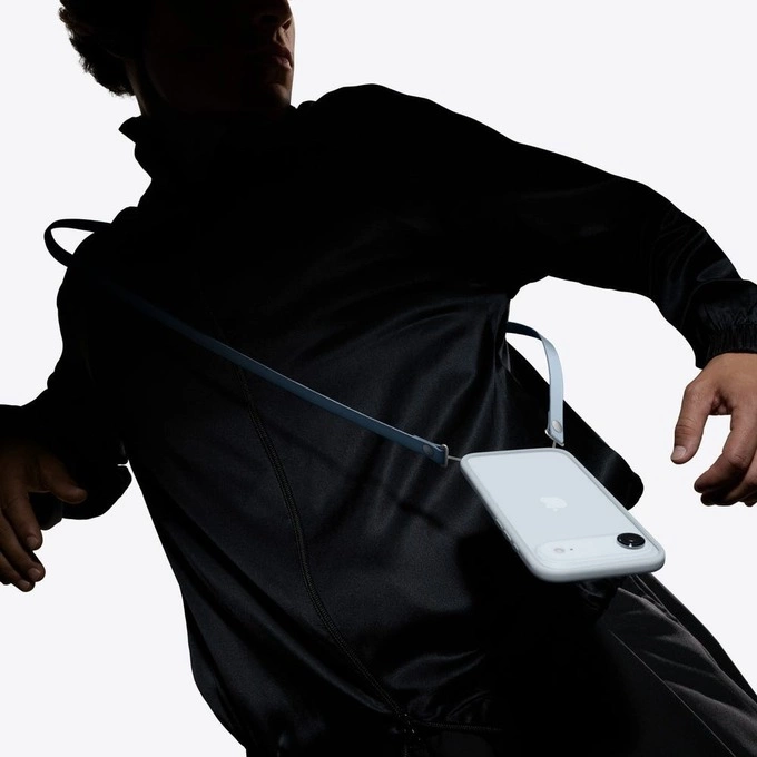 Apple’s crossbody strap attached to an iPhone 17. Photo courtesy of Apple