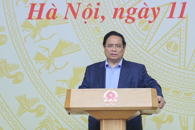 Prime Minister Pham Minh Chinh speaks at a conference on social housing on Oct. 11, 2025. Photo by VGP