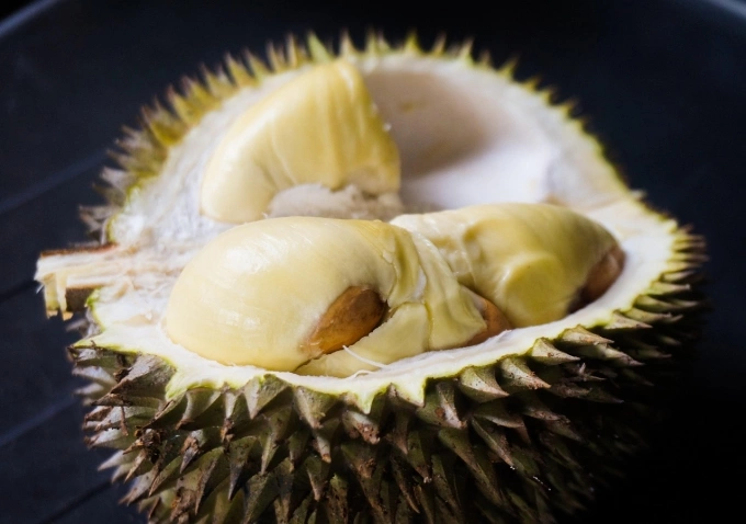 An opened durian. Photo by Pixabay/najibzamri