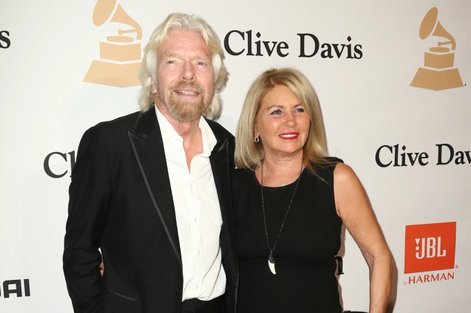 Richard Branson, left, and Joan Templeman appear at the 2016 Clive Davis Pre-Grammy Gala, in Beverly Hills, Calif., Feb. 14, 2016. Photo by AP