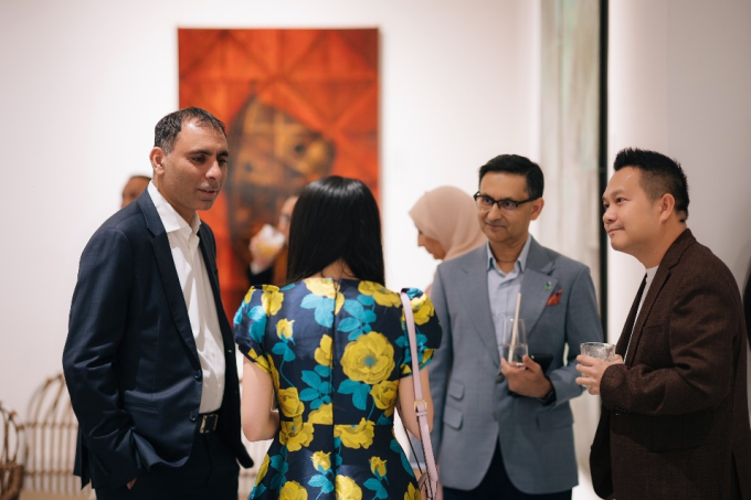 Visitors at the art exhibition. Photo courtesy of Standard Chartered Bank Vietnam