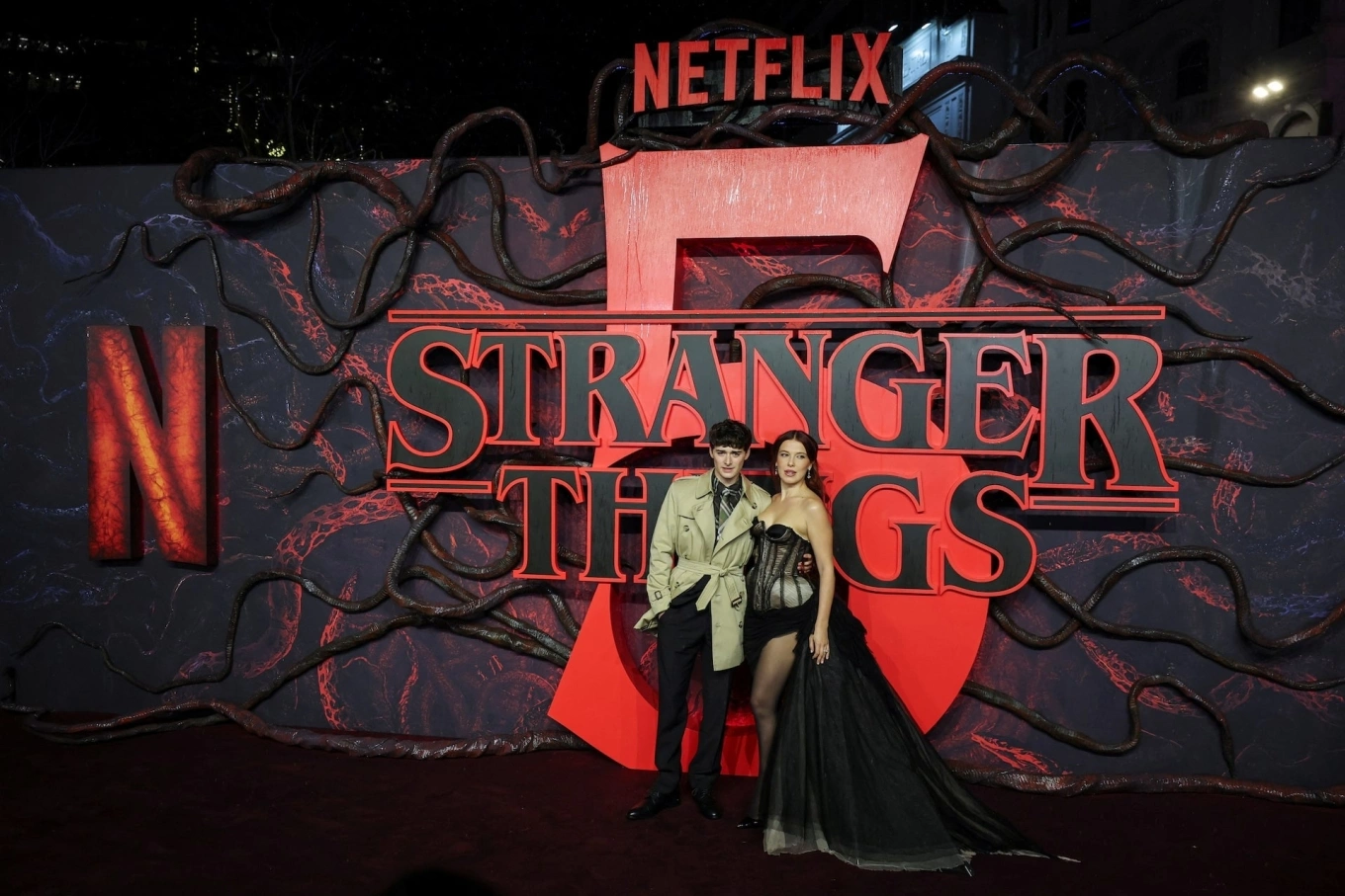 Cast members Noah Schnapp and Millie Bobby Brown attend the screening for the final season of the television series Stranger Things, at Odeon Luxe Leicester Square in London, Britain, Nov. 13, 2025. Photo by Reuters