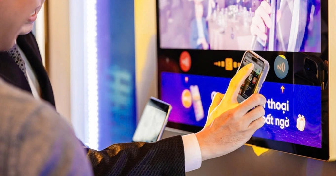 Chicilon Media integrates NFC to allow users to interact directly by tapping their phone to receive incentives. Photo courtesy of Chicilon Digital Media