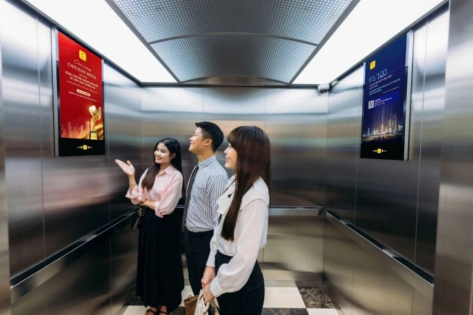Advertising screens installed in an office lobby. Photo courtesy of Chicilon Digital Media