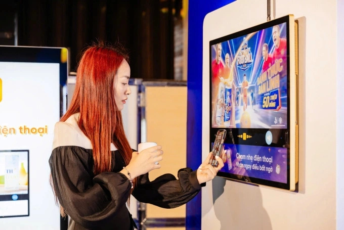 Guests test NFC features at the companys event. Photo courtesy of Chicilon Digital Media