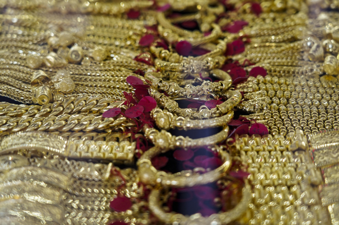 A display of gold ornaments at a gold shop in Chinatown, Bangkok, Thailand, 10 March 2022. Photo by NurPhoto via AFP