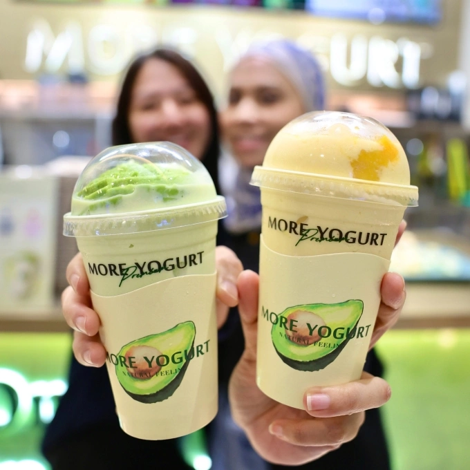 Customers hold More Yogurt cups in Malaysia. Photo courtesy of MyTOWN Shopping Centre